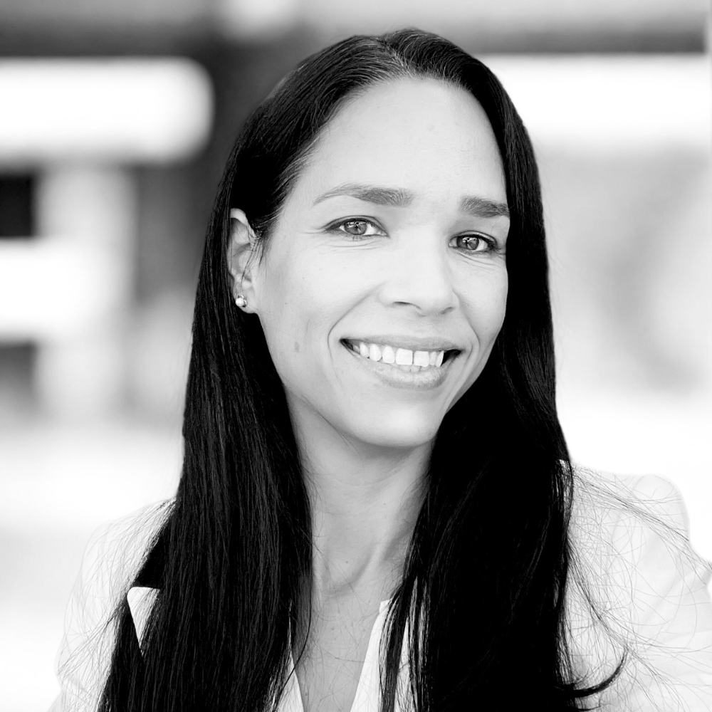 Black and white portrait of a woman with long dark hair.